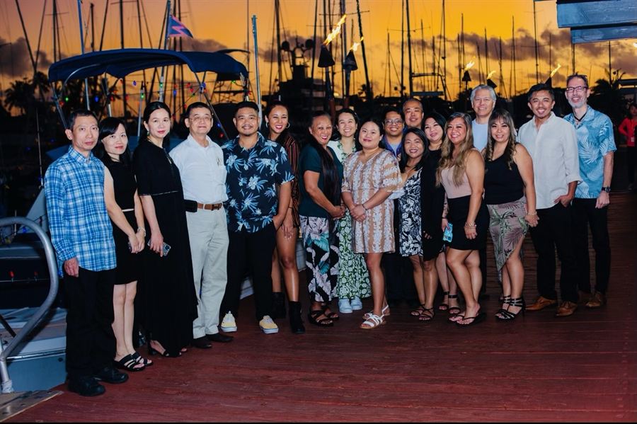 The team at sunset by the harbour