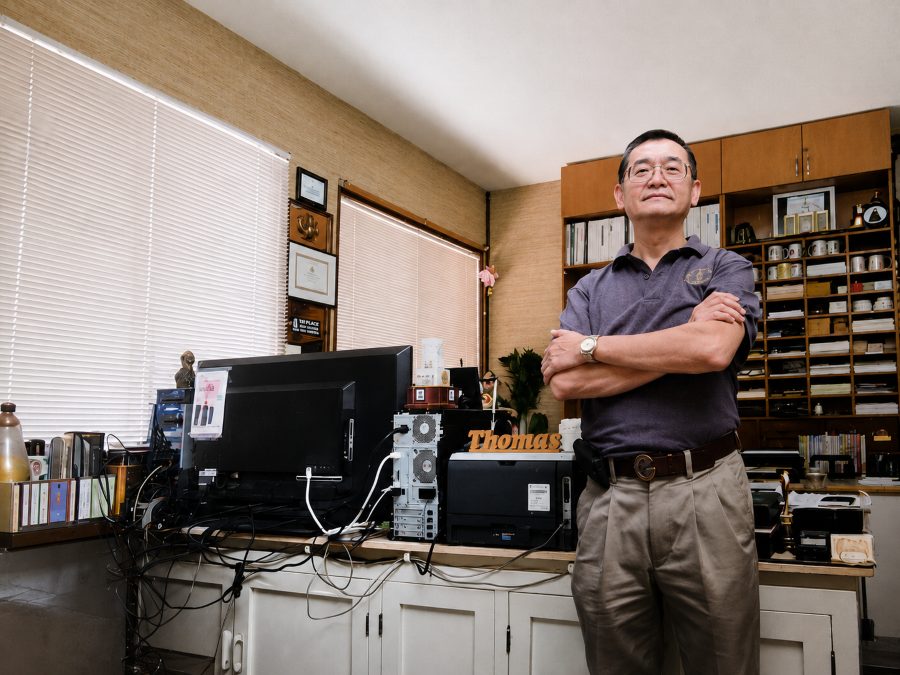 Thomas, who founded the practice in 1991, in his office at the clinic